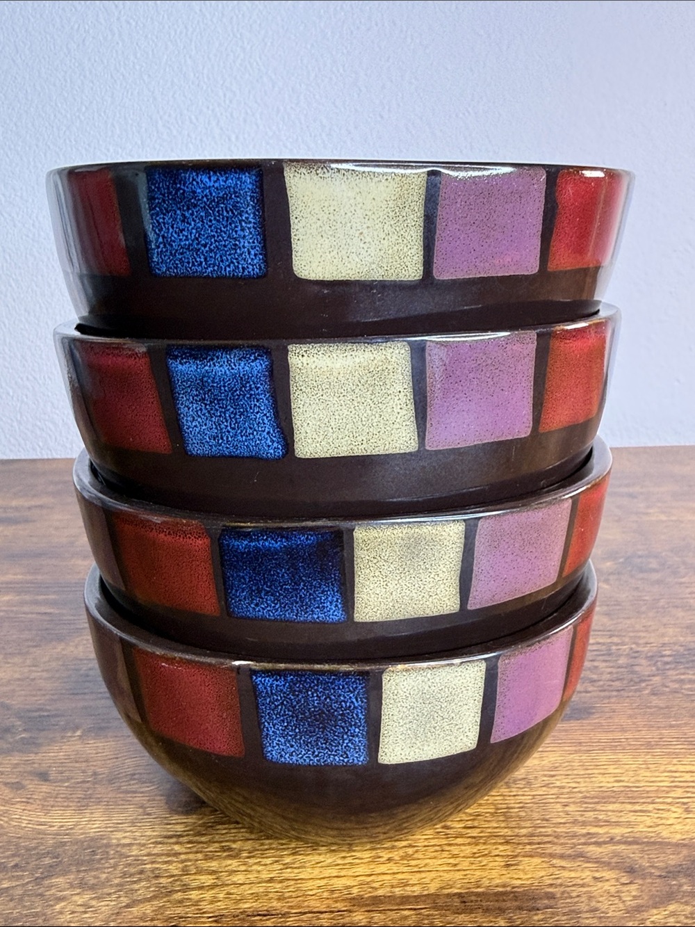 Gibson Brown Ceramic Bowls with Blue, Cream, Purple, Red Accents Set Of 4